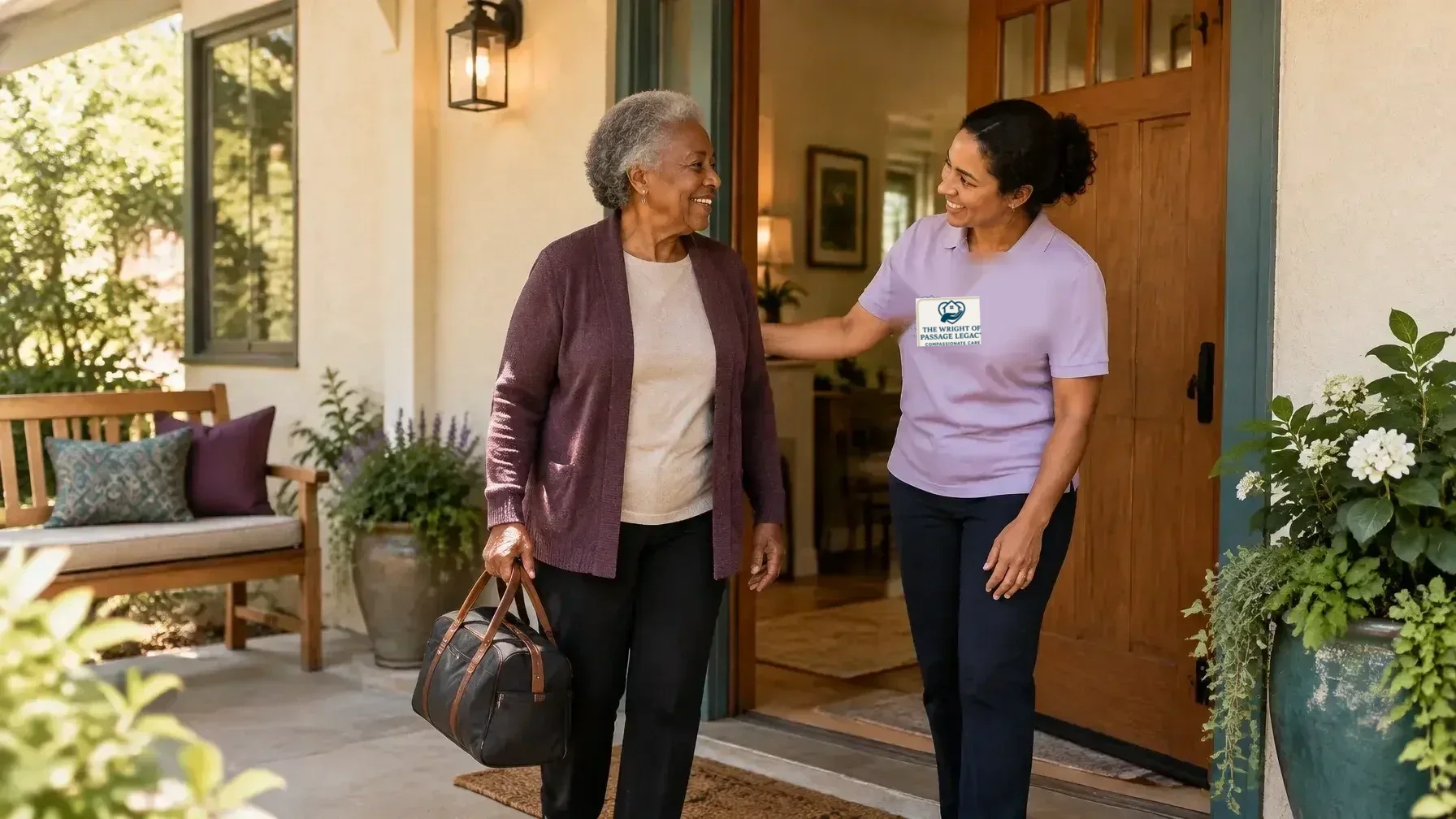 Caregiver in a light purple Wright of Passage Legacy shirt welcoming a senior resident at a warm family-style home entrance